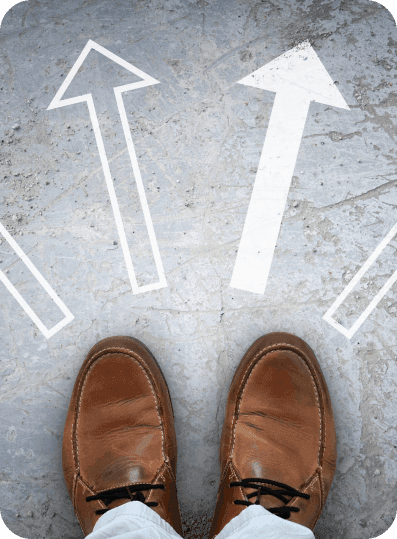 Man with four arrows in front for direction