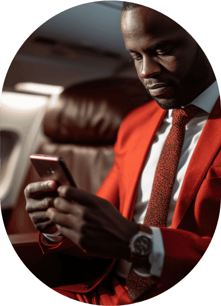Man on red suit on his phone