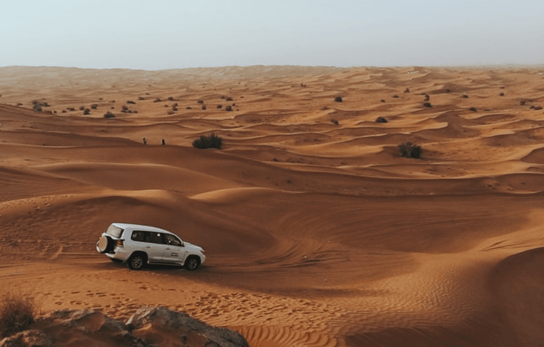 A car moving in the desert