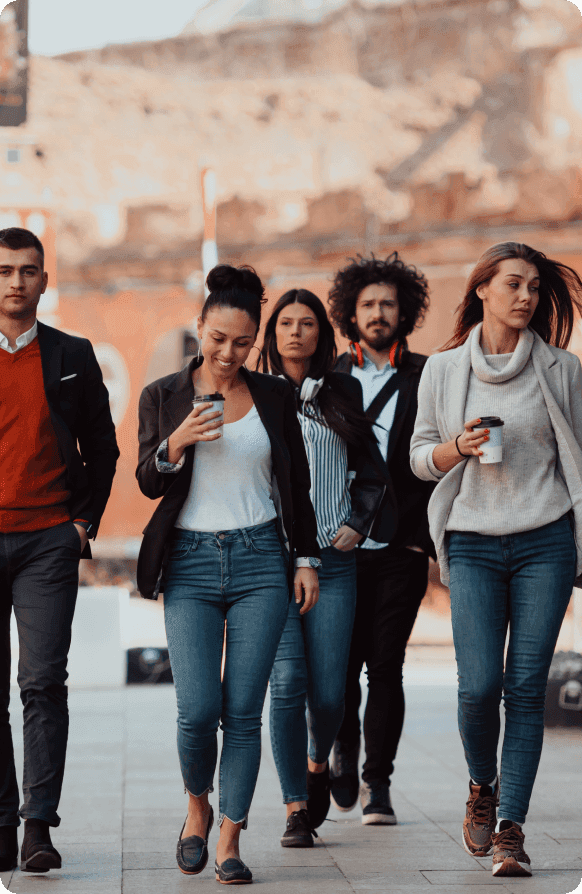 A group of people walking on the street